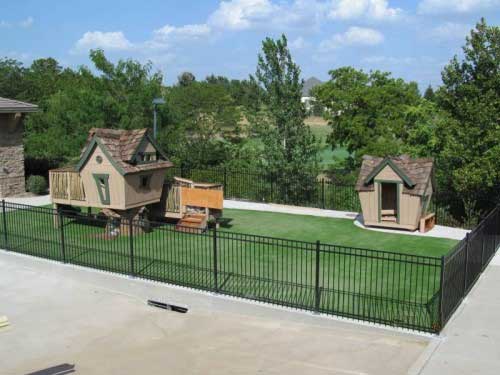 Tree fort on artificial playground turf in St. Louis, MO
