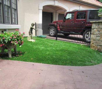 residential Artificial landscape grass next to the front walkway in St. Louis, MO