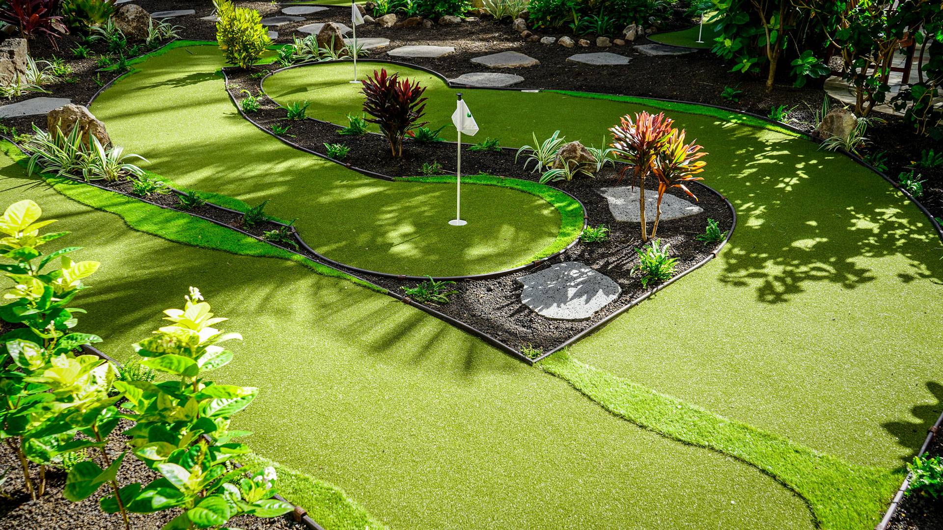 Beach themed artificial grass putting green