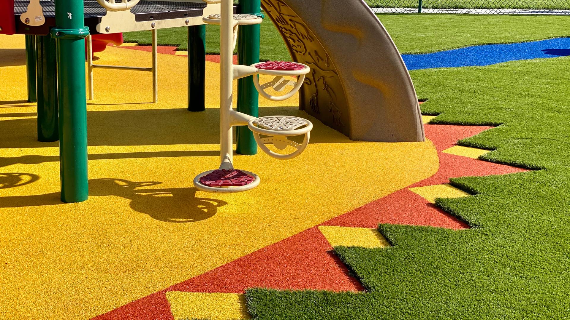 Close up shot of artificial grass playground installed by SYNLawn