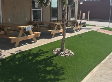 Artificial grass restaurant patio installed by SYNLawn