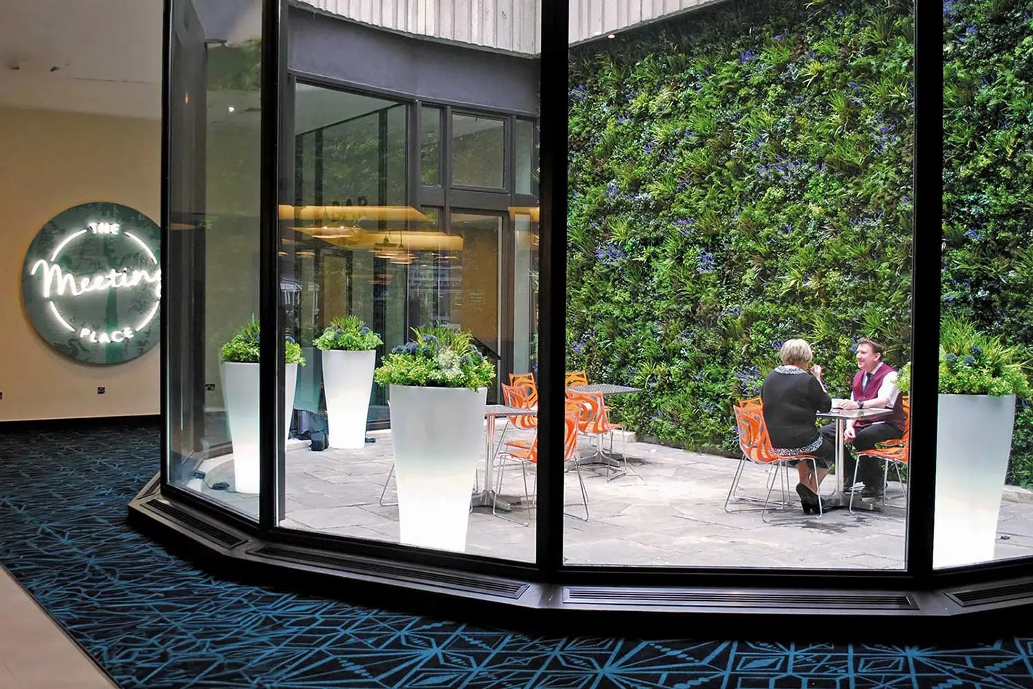 Artificial living wall in restaurant from SYNLawn